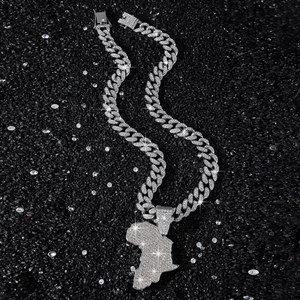 Iced out Cuban link chain necklace with a large Africa map pendant in silver finish