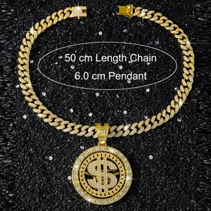 Detail of 50cm golden Cuban link chain with iced-out 6cm spinning dollar sign pendant