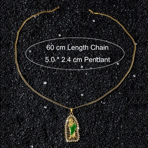 Detailed size view of Saint Jude pendant with green enamel and white zircon stones