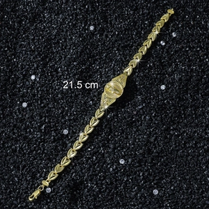 Detailed view of Saint Jude religious pendant on a golden V-link chain bracelet
