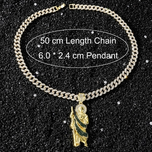 Close-up of Saint Jude religious pendant with cubic zirconia on gold Cuban chain