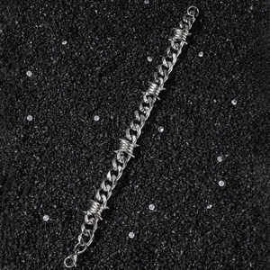 11mm wide Cuban link bracelet with barbed wire elements in silver stainless steel finish