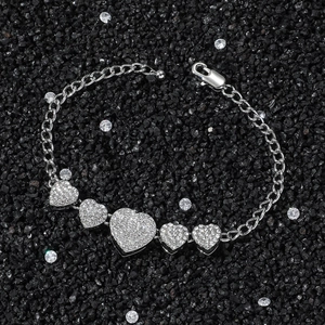 Hip hop style chunky silver chain bracelet with five pavé crystal heart charms