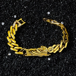 Gold St. Jude hip hop chain bracelet featuring polished diamond-set clasp and religious charm