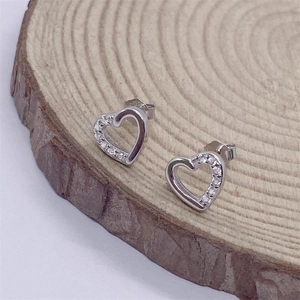 Sparkling S925 sterling silver hollow heart stud earrings with cubic zirconia stones