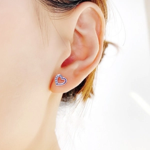 Elegant S925 sterling silver hollow heart earrings with side-set sparkling cubic zirconia