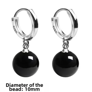 Detail of S925 sterling silver stamp and 10mm black onyx bead on elegant drop earring