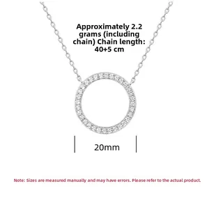 Detail of S925 sterling silver circle pendant with sparkling cubic zirconia inlay