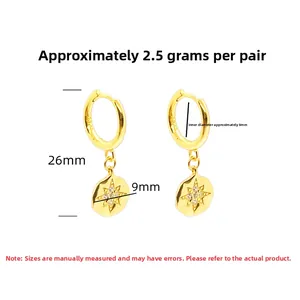 Detail view of gold S925 sterling silver star earrings with 26mm length dimensions