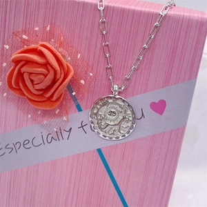 S925 sterling silver sun dog necklace with zodiac lion pendant on a pink gift box
