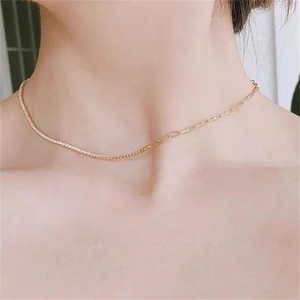 Detail of s925 gold necklace featuring sparkling zircon tennis chain and paperclip links