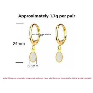 Detail showing 8mm gold hoop earrings with white opal stone and product dimensions