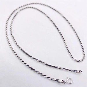 Close-up of vintage S925 sterling silver rope chain showing the 925 hallmark and spring clasp