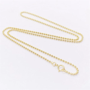Detailed close-up of S925 sterling silver ball chain necklace with spring ring clasp in gold