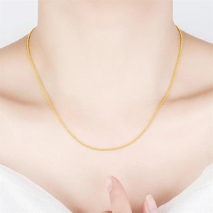 Minimalist S925 sterling silver gold plated bead chain necklace worn by a model