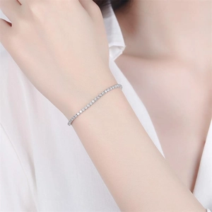 Elegant S925 sterling silver tennis bracelet with sparkling zircon stones on female wrist