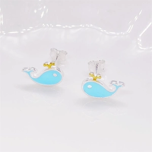 S925 sterling silver blue whale stud earrings with gold accents on white tray