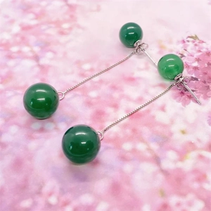 Detailed view of S925 sterling silver long tassel earrings with green agate beads