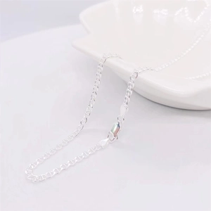 Detail of S925 sterling silver long mariner link chain with secure lobster clasp closure