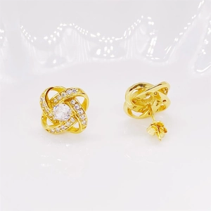 S925 sterling silver 18K gold plated rotating clover stud earrings with sparkling diamonds