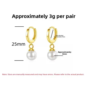 Detail view of gold-plated S925 silver pearl drop earrings with 25mm length dimensions