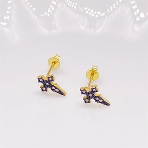 Macro detail of S925 sterling silver cross studs with blue zircon inlay and S925 hallmark