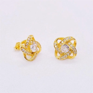 Detailed close-up of S925 sterling silver earring back with authentic metal hallmark