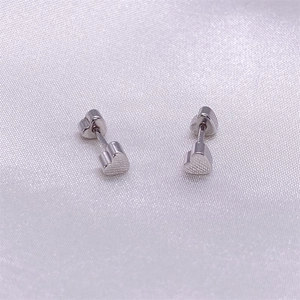 Close-up of S925 sterling silver heart stud earrings with a brushed metal finish