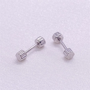 Close-up of S925 sterling silver screw back stud earrings with vertical textured design
