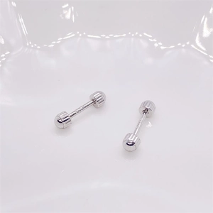 Macro shot of S925 sterling silver screw back earrings with polished ball design