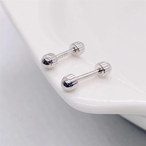 Detailed view of S925 sterling silver screw ball stud earrings with visible hallmark
