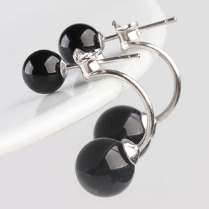 S925 sterling silver earrings with black agate beads on curved metal lines