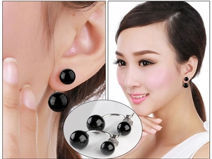 Detail of S925 silver black onyx double ball earrings shown on model and close-up