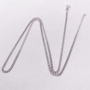Minimalist S925 sterling silver Cuban link necklace with spring clasp on grey background
