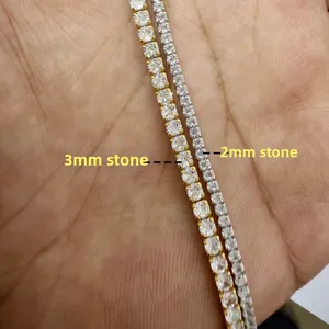 Close-up comparison of 2mm and 3mm cubic zirconia tennis bracelets in silver and gold