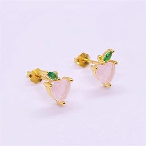 Detailed close-up of S925 sterling silver peach stud earring with pink heart crystal