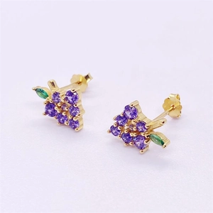 Detail of S925 sterling silver grape earrings featuring purple zircons and green leaves