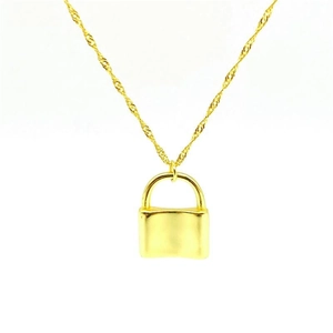 Detail of a minimalist gold-plated lock pendant on a fine twisted chain necklace