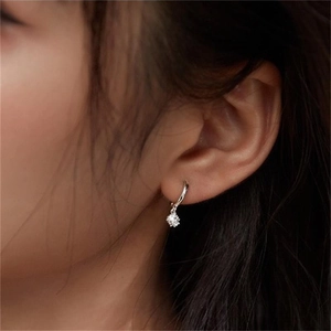 Minimalist S925 sterling silver hoop earrings with cubic zirconia charms on model