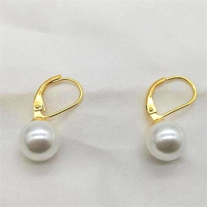 Elegant S925 sterling silver drop earrings with round white pearls and golden hooks
