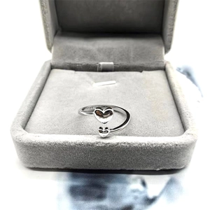 Detailed shot showing S925 hallmark on the inner band of heart-shaped silver open ring