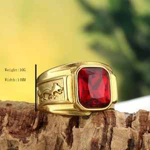 Vintage mens gold titanium steel ring with large ruby gemstone and animal relief carving