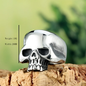 Punk style stainless steel skull ring for men with 26mm width and polished finish