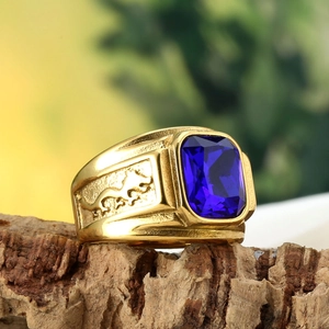 Men's vintage gold titanium steel ring with blue rectangular gemstone and animal relief