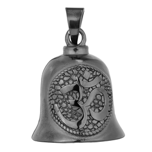 Macro detail of black stainless steel bell pendant with embossed Om spiritual symbol
