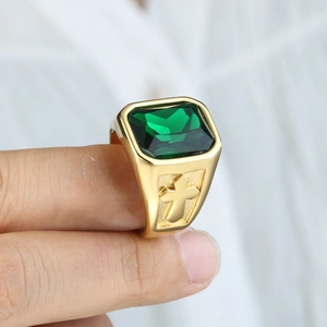 Men's gold titanium steel ring with emerald-cut green gemstone and side cross relief