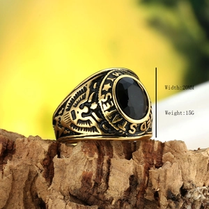 Vintage US Eagle signet ring in gold finish with black gemstone and engraved details