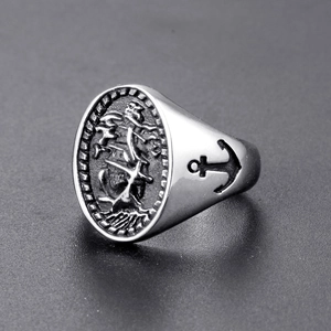 Vintage silver steel men's signet ring featuring detailed sailing boat and anchor relief