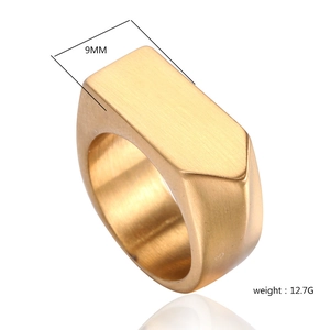 Detail of 9mm wide gold stainless steel ring with brushed texture weighing 12.7g