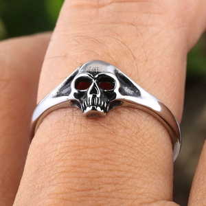 Punk vintage dual skull heart ring in silver finish for men and women on finger
